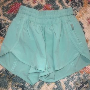 Aqua colored Lululemon shorts